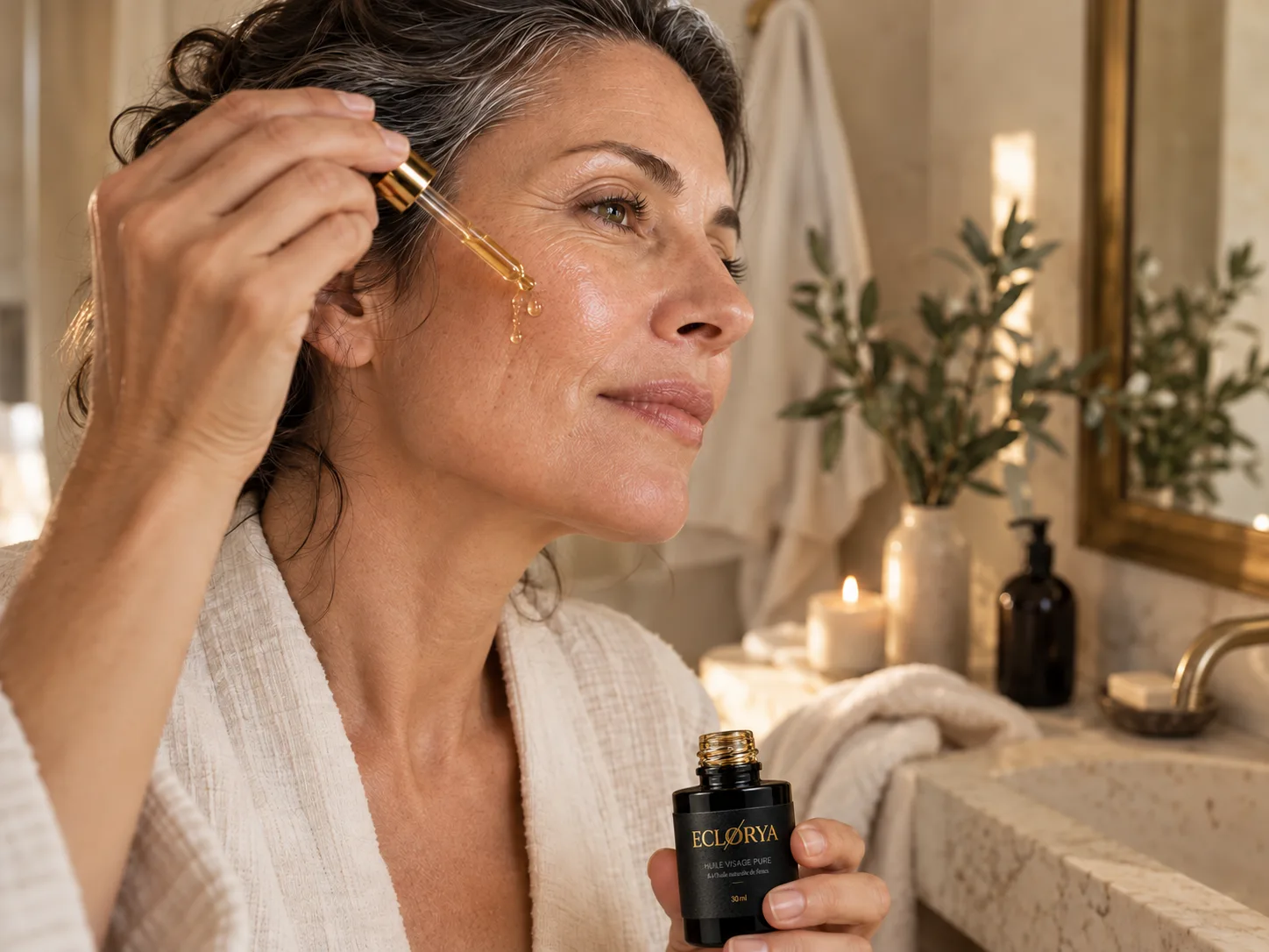 Peau mature entre 40 et 60 ans avec rituel huile visage et lumière douce